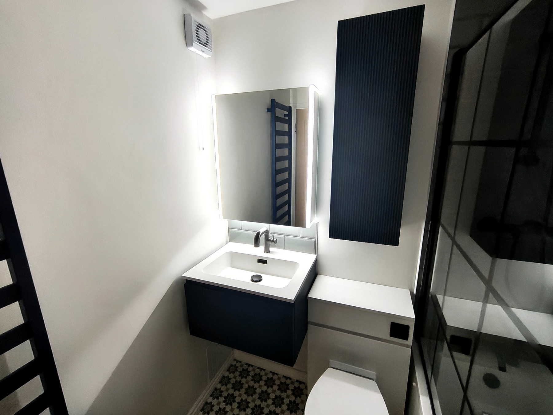 Modern bathroom vanity unit and WC installation