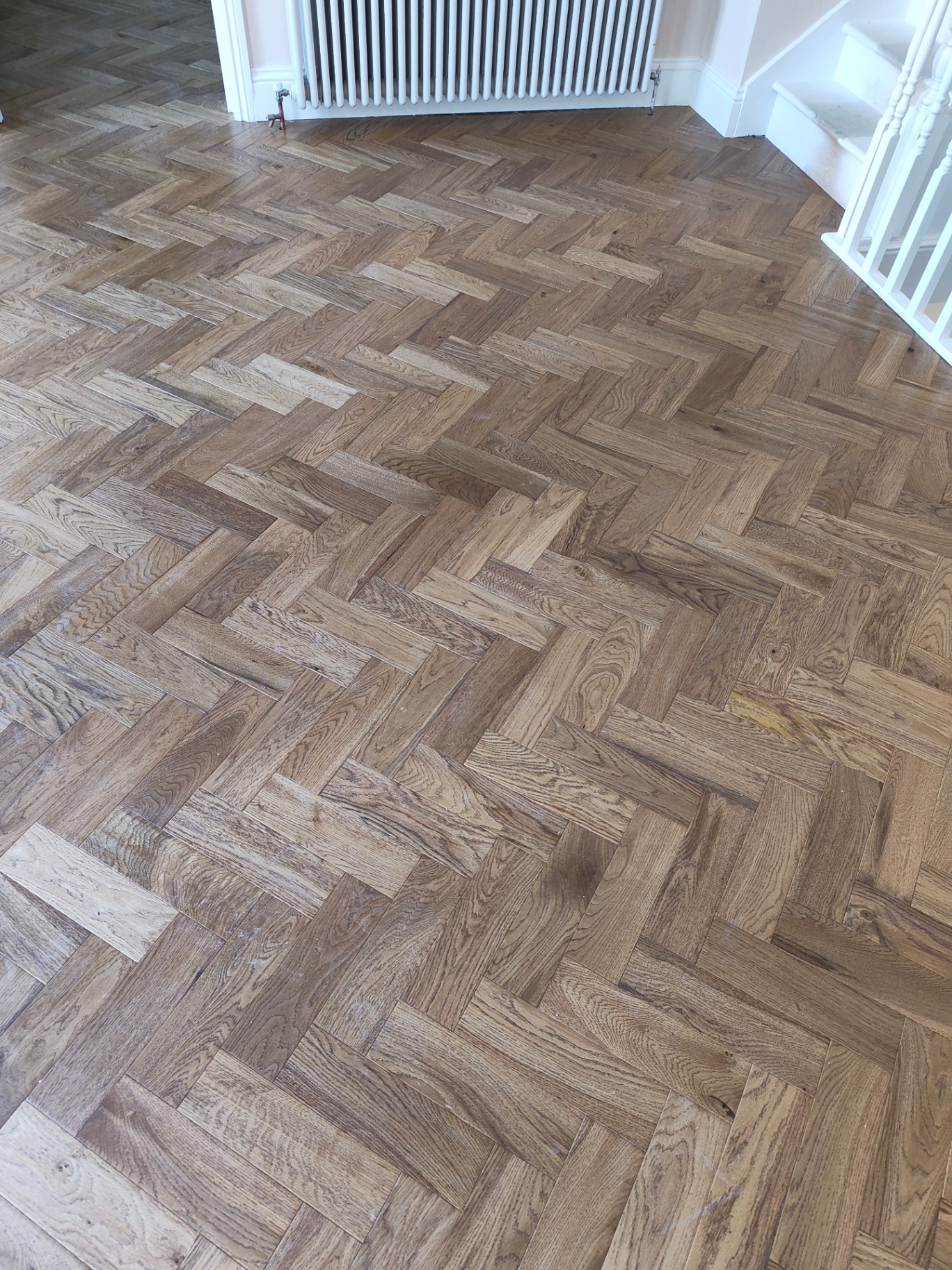 Restored oak herringbone parquet floor