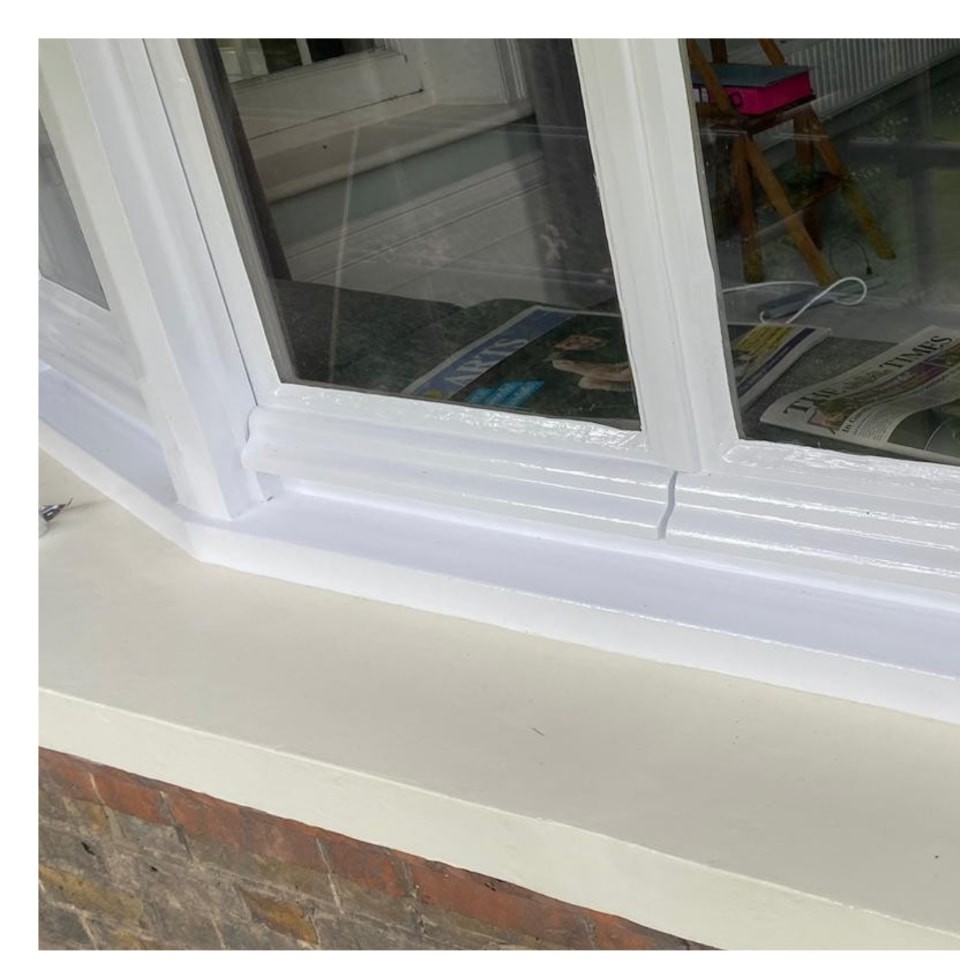 Restored bay sash window on Aberdeen Park, Highbury with spliced timber and freshly painted white frame